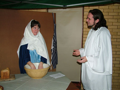 Mary, in her kitchen, is visited by Gabriel